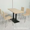 Golden elephant color non-porous chair + black table legs