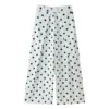 White with black polka dots