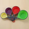 Folding measuring cup