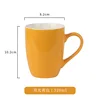 Glossy yellow drum-shaped cup