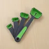 Folding measuring spoon green