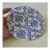 Almohadilla redonda azul y blanca