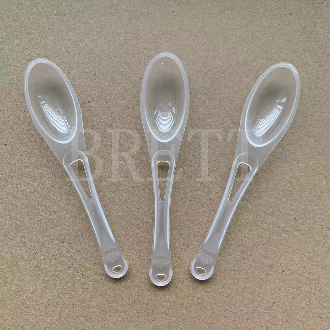 Hot selling 7g disposable foil seal wrapped plastic honey spoon wholesale