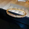 1 braccialetto-oro-fiori