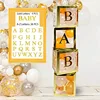 4 scatole d'oro + bambino + 26 lettere
