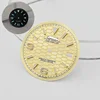 Gold dial with s logo gold nails