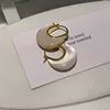 conchiglia bianca bifacciale oro misura piccola 2 cm