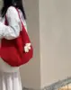 Borsa rossa a fiori grandi
