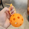 Orange-shaped ball with rubber buckle