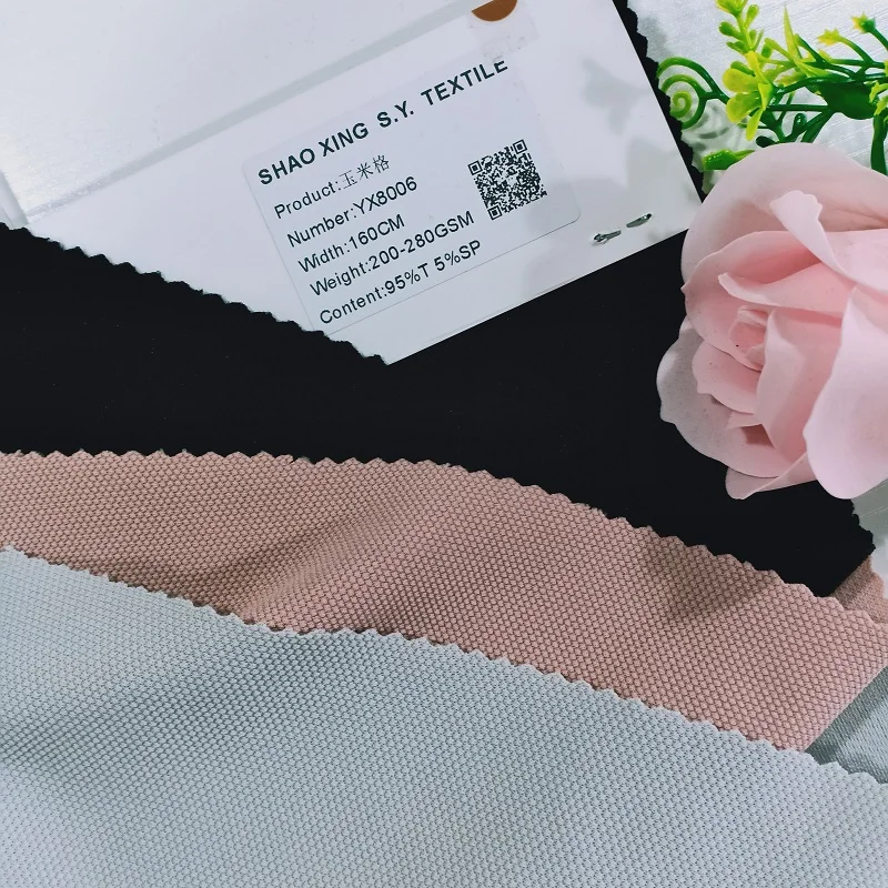 
 Дешевые трикотажные ткани из смеси спандекса и полиэстера жаккарда кукурузы для платья или домашнего текстиля  