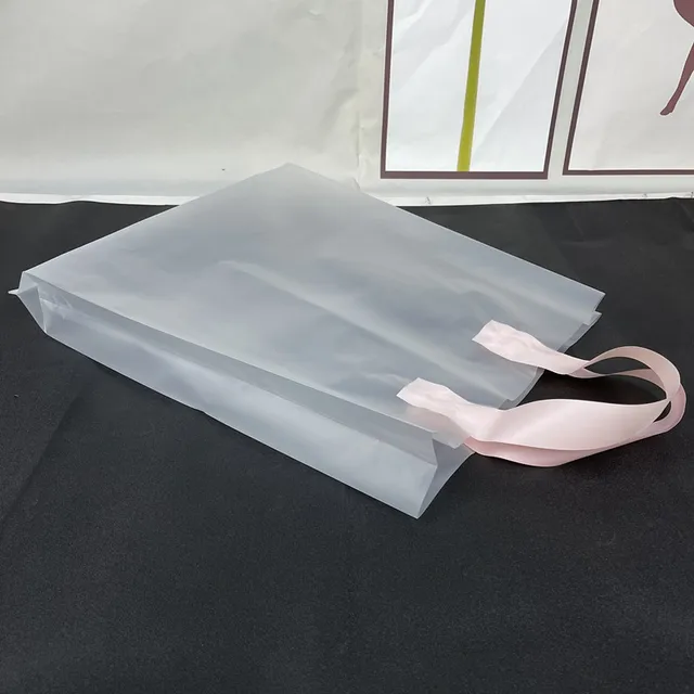 Factory Wholesale Transparent Plastic Tote Bag Custom Printed Low-Pressure Simple Thick Shopping Bag for Clothing Packaging
