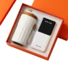 Tasse à café dorée + batterie externe Newman à quatre fils