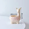 Giraffe flower pot