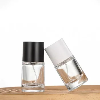 Custom New Design Luxury Cylinder Clear Perfume Glass Bottle 30ml 50ml 100ml Round Empty Perfume Bottle With Black Cap