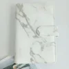 Reliure en marbre blanc