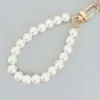 Mousqueton en or blanc de 8 mm