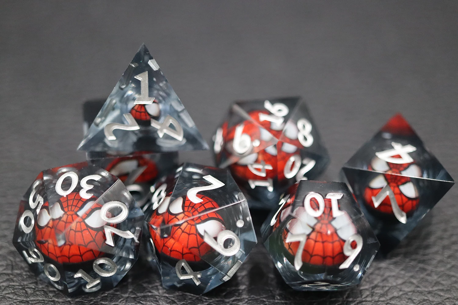 Yushun 7-Piece DND Game Set Red Resin Dice with White Numbers Spiderman Themed Board Game Dice Set manufacture