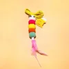 Pink feathers, caterpillar