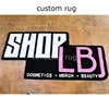 Alfombra con logo