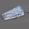 Large transparent triangular door stop