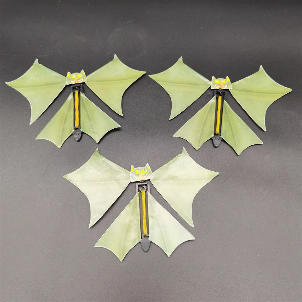 Magic rubber band wind up paper flying bat toys