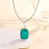 Emerald pendant with light chain