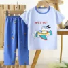 Dxck11 - Manica corta, pantaloni lunghi - Cucciolo in aereo