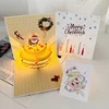 Pastel de Papá Noel con luces musicales.
