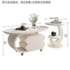 Mesa auxiliar 804050 con base color albaricoque y tablero de piedra blanca.