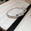 10 bracciali - argento - geometrici - placcatura in oro vero