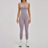 Conjunto de top y leggings morado claro