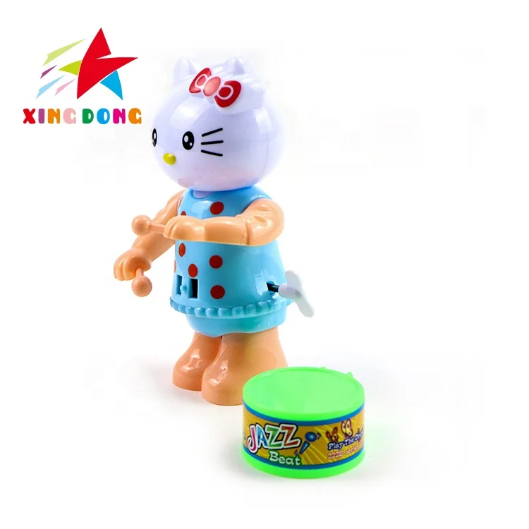 Wholesale custom wind up toys cute mini cartoon boy beat a drum