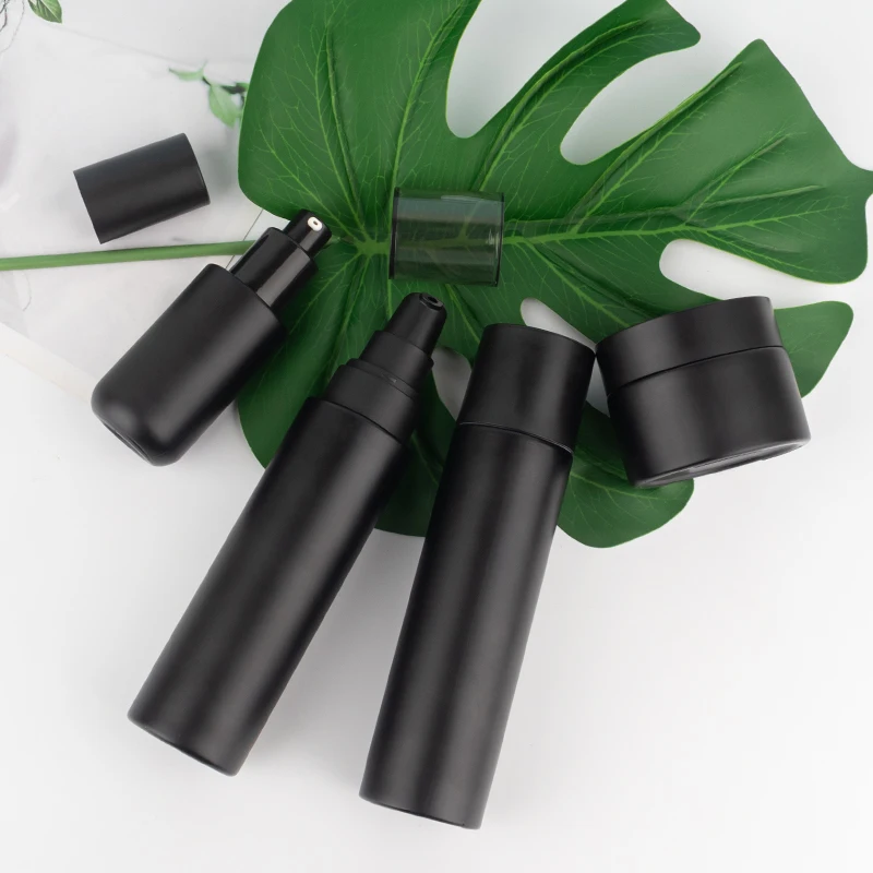 Luxury cosmetic packaging set 50g 40ml 100ml 120ml matte black round cosmetic glass bottle pump lotion bottles details