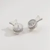 White K butterfly earrings