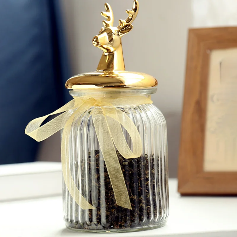 glass cookie jar with decorative deer