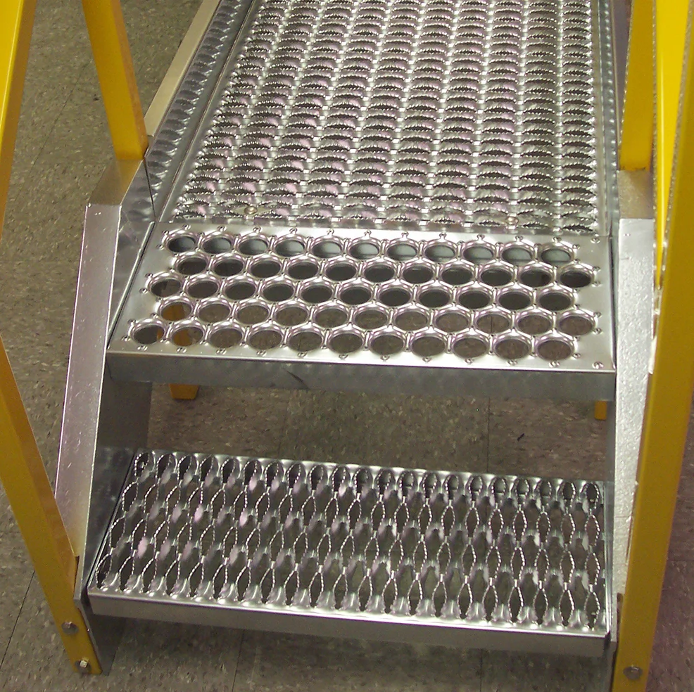 201 stainless steel checker plate installed on industrial stairs