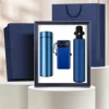 แก้วเก็บอุณหภูมิ LCD + เสื้อกันฝน + พาวเวอร์แบงค์แบบพกพา - สีฟ้า