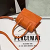 orange mini handbags