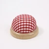 Red and white plaid log base