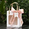 White+ribbon+hang tag