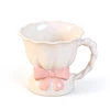 Blanc avec nœud rose