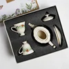 1 pot and 2 cups and saucers white