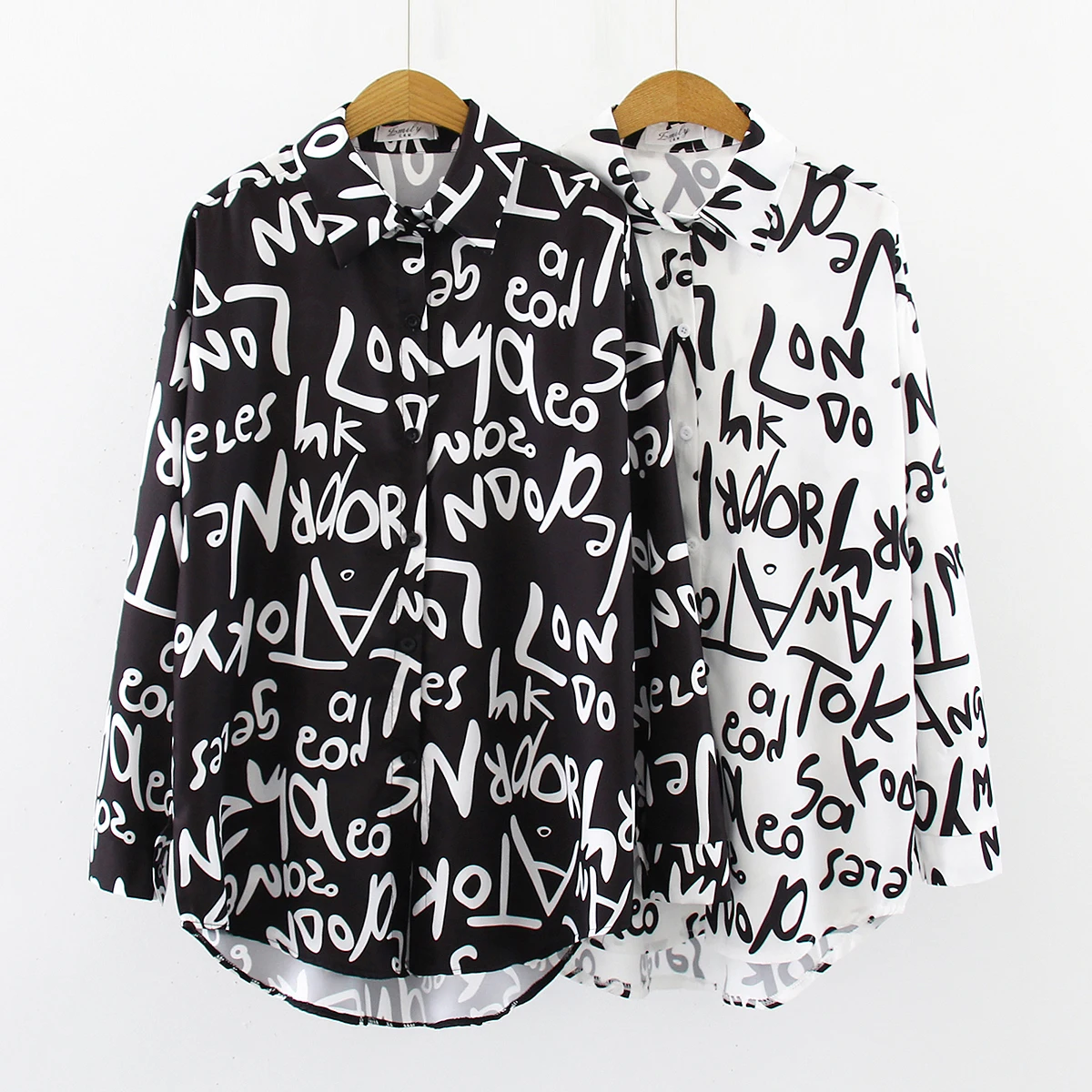 Fashion Shirts Longsleeves Umbro Longsleeve white-black printed lettering casual look 