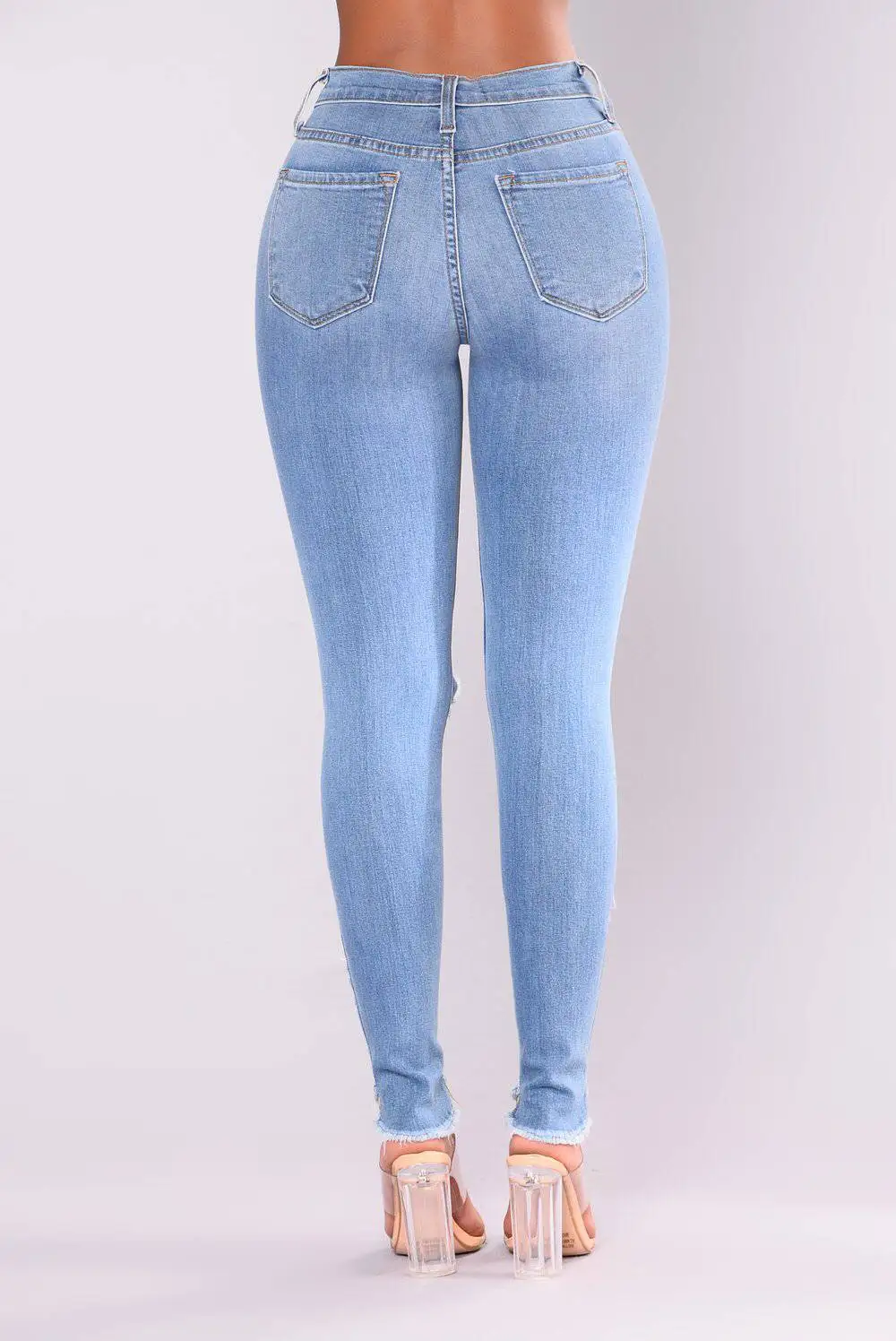 OEM&ODM New Fashion Design Denim High-Waisted Cut Seam and Split on Front  Side The Bottom Have Remove The Stitching After Washing Middle Blue Color  Lady Jeans - China Skinny Jeans and Denim