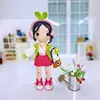 Peluche ragazza che canta