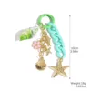 Verde--K2508-7--Estrellas de mar y caracoles marinos