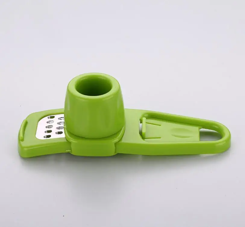 Creative Plastic kitchen gadgets wholesale cheese slicer multi kitchen grater ginger grater plastic garlic press