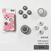 Bouton Ns en silicone gris sésame