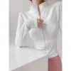 Look amincissant taille blanche