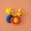 Star, moon and sun keychain